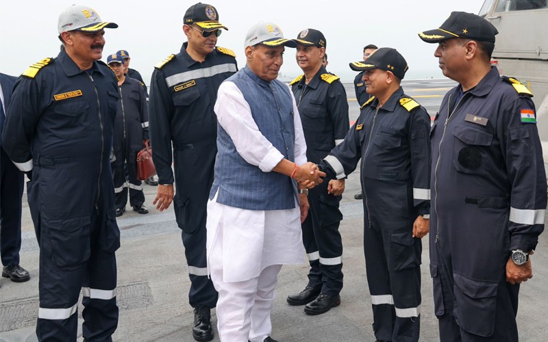 In Images: Rajnath Singh addresses officers onboard INS Vikrant