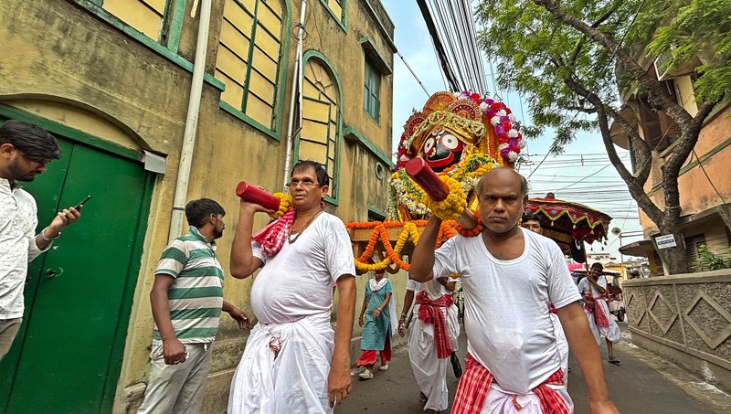 In Images: Devotees perform in north Kolkata as they proceed to fetch holy water for Jagannath Snan Yatra