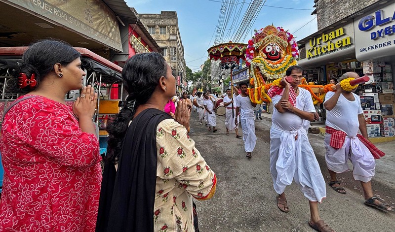In Images: Devotees perform in north Kolkata as they proceed to fetch holy water for Jagannath Snan Yatra