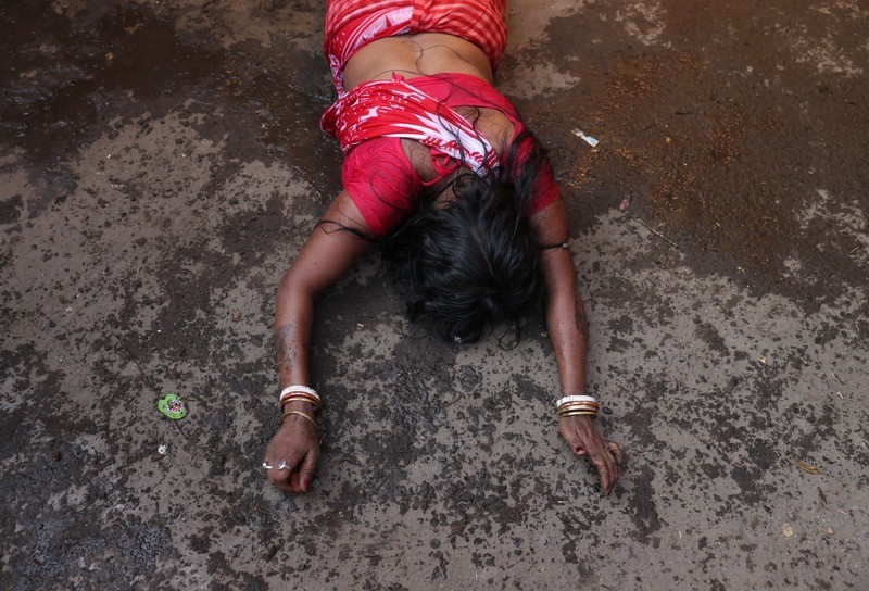 In Images: Devotees worship Goddess Sheetala with fire rituals in Kolkata