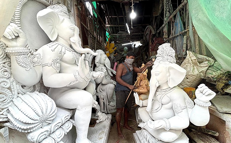 Kumartuli artisans shape Ganesha Idols ahead of Festivities