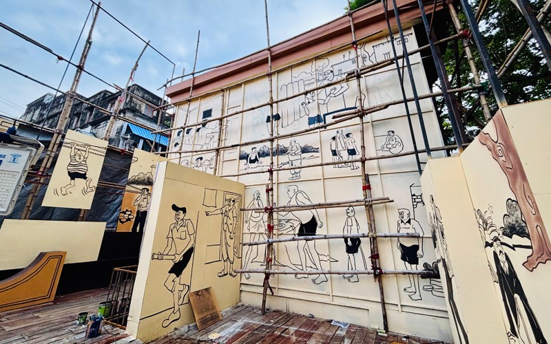 In images: Kolkata’s Kumortuli Sarbojonin Durga Puja 2025 pays tribute to cartoonist Narayan Debnath