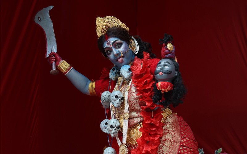 In Images: Dancers perform before Goddess Kali at a pandal in Kolkata