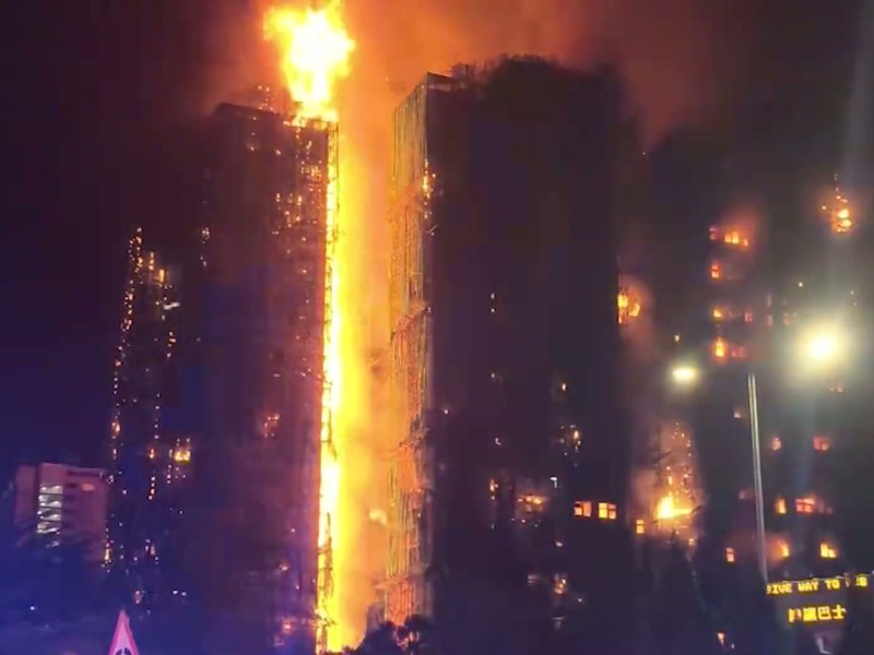 Hong Kong high-rise fire kills 128, with 200 missing as investigators probe rapid multi-building spread.