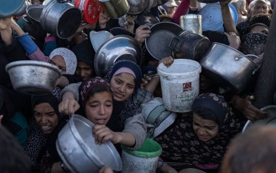 Gaza: Israeli tank shelling close to aid centre leaves 26 dead