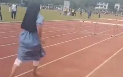 Kerala nun Sister Sabina, dressed in religious uniform, wins hearts by crossing hurdles at athletics meet