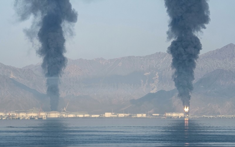 Smoke rises near Fujairah oil terminal hours after US airstrikes on Iran’s Kharg Island.