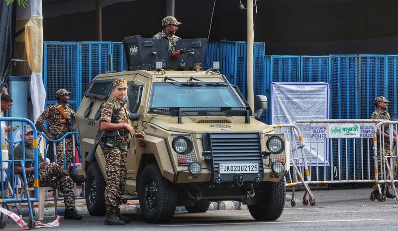 In Images: Armoured vehicle stands guard outside strongroom in Kolkata ahead of counting day