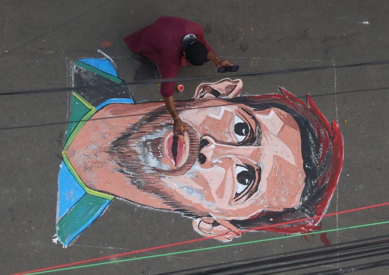 In Images: Kolkata artist celebrates global football icons with vibrant street murals