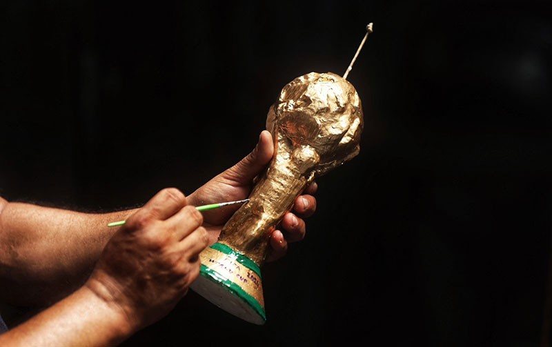 In Images: Kolkata's wax wizard brings FIFA World Cup trophy to life