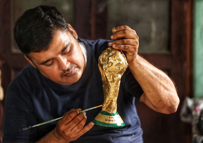 In Images: Kolkata's wax wizard brings FIFA World Cup trophy to life
