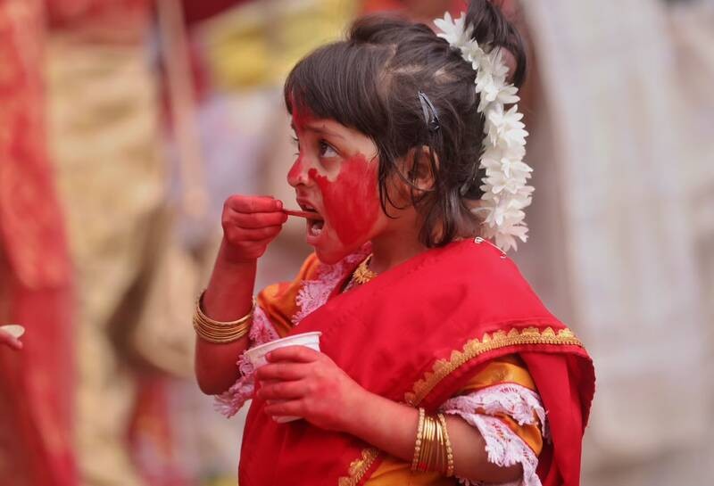 In Images: Sindoor Khela, idol immersion mark Bijoya Dashami in Kolkata