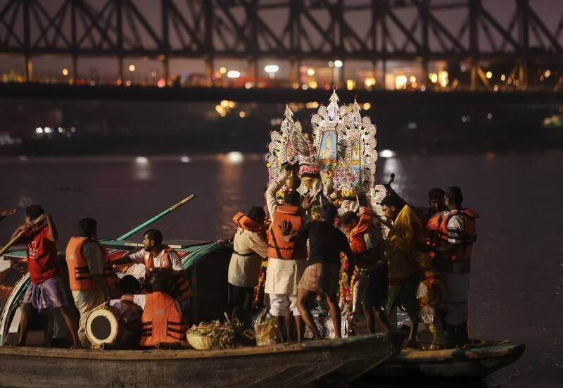 In Images: Sindoor Khela, idol immersion mark Bijoya Dashami in Kolkata