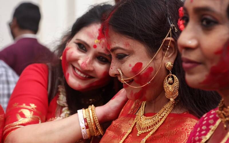 In Images: Sindoor Khela, idol immersion mark Bijoya Dashami in Kolkata