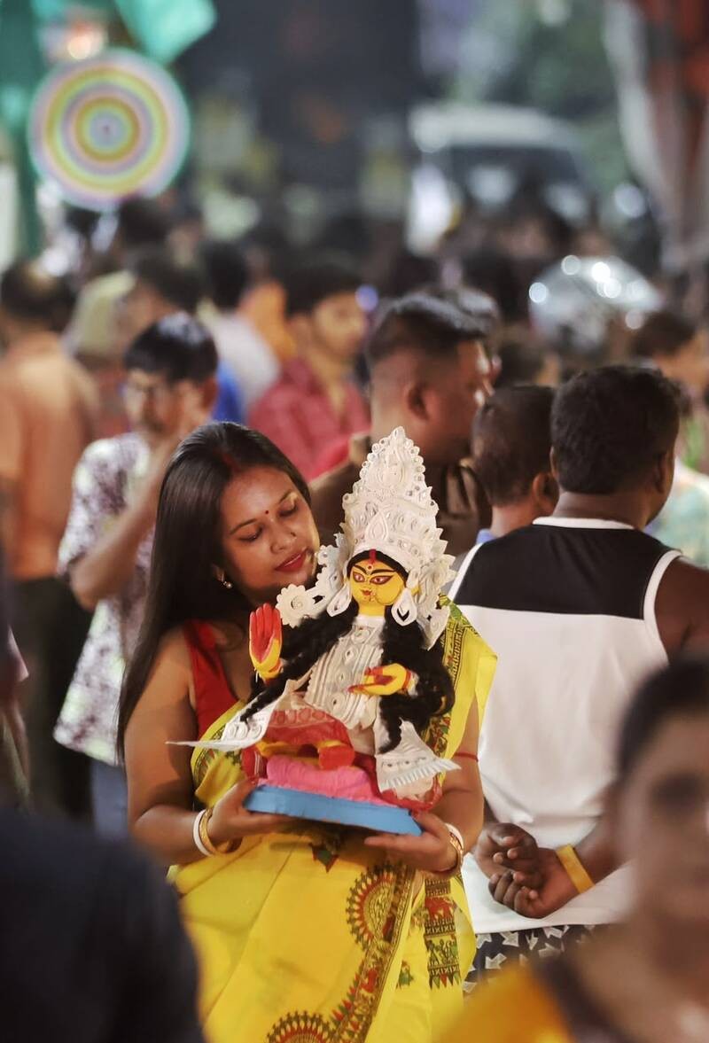 In Images: Kolkata gears up for Lakshmi Puja with idol sales at Kumartuli, alpana decorations at homes