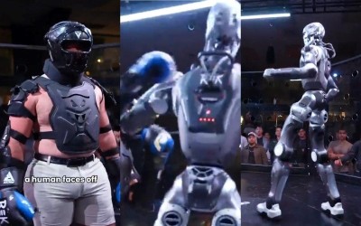 Human vs Robot! Influencer enters ring with 6-foot humanoid in wild fight