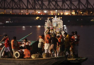 In Images: Sindoor Khela, idol immersion mark Bijoya Dashami in Kolkata