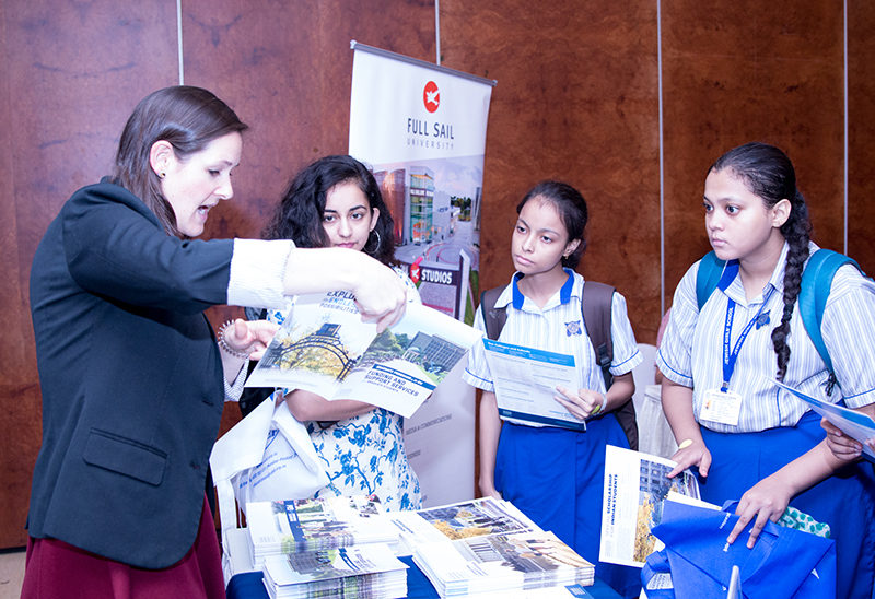 Aspiring Indian high school students engage with representatives of American universities at an education fair in Kolkata co-hosted by United States-India Educational Foundation (USIEF). Photo courtesy: American Center, Kolkata