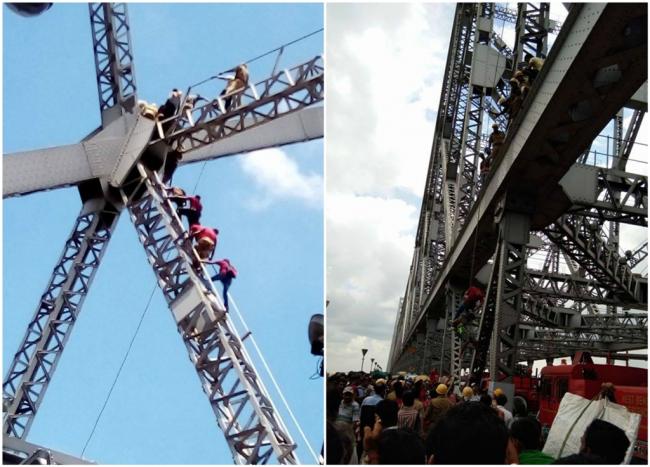 Kolkata: Mentally challenged man climbs up Howrah Bridge, rescued unhurt