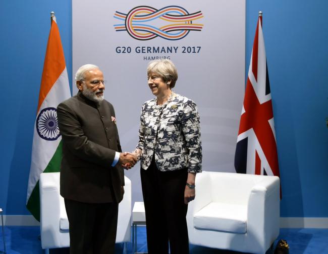 Prime Minister Narendra Modi meets UK PM Theresa May