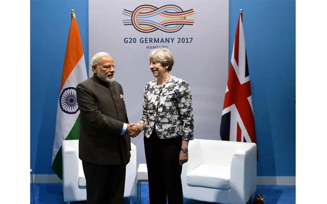 Narendra Modi seeks UK PM Theresa May's help on 'economic offenders'