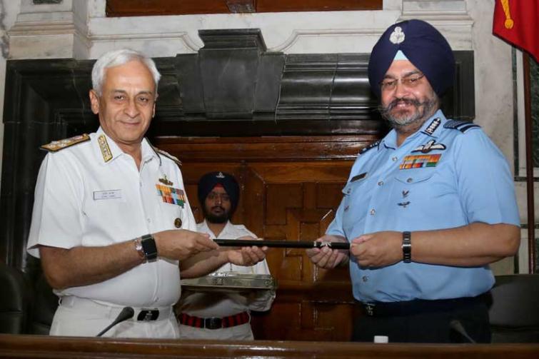 Air Chief Marshal BS Dhanoa receives Baton of Chairman COSC