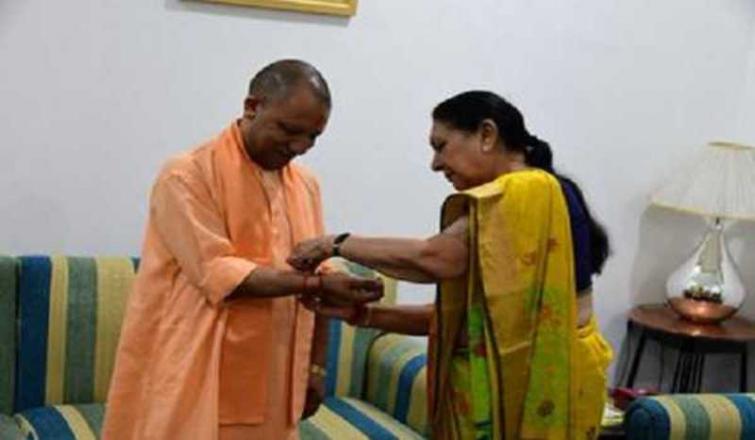 UP Governor Anandiben Patel ties rakhi to CM Yogi