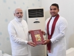 Sri Lankan Minister hands first copy of Sinhala-Tamil translation of Bhagavad Gita to PM Narendra Modi