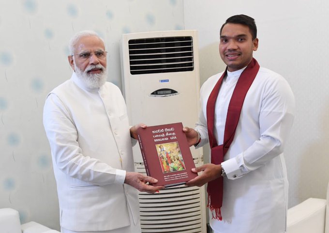 Sri Lankan Minister hands first copy of Sinhala-Tamil translation of Bhagavad Gita to PM Narendra Modi