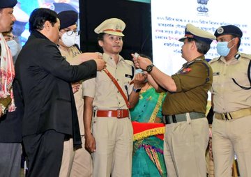 Assam CM Sonowal presents appointment letter to ace athlete Hima Das as DSP in Assam Police