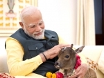 PM Modi welcomes new member Deepjyoti at his residence