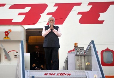 Narendra Modi returns home