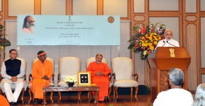 PM releases commemorative coin on Swami Chinmayananda