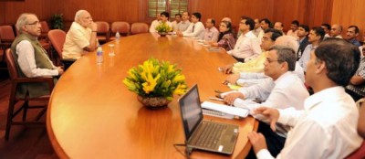 PM interacts with officers of PMO