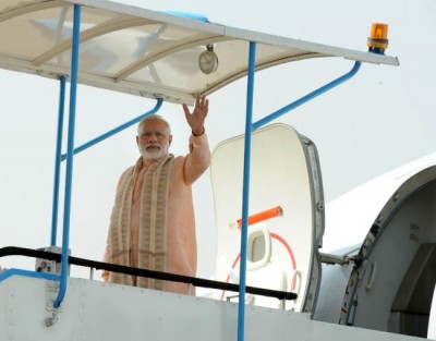 PM Modi reaches Qatar