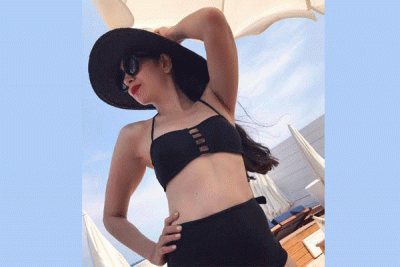 Karishma Kapoor sizzles in black bikini