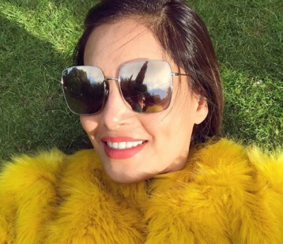 Bipasha Basu lies on green grass, feels immensely happy