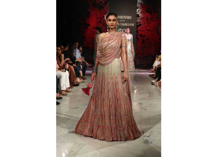 Models walk the ramp for Tarun Tahiliani's show