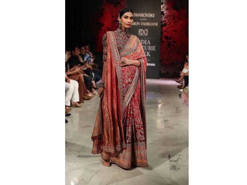 Models walk the ramp for Tarun Tahiliani's show