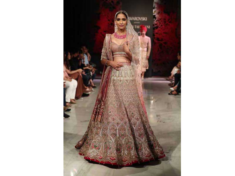 Models walk the ramp for Tarun Tahiliani's show