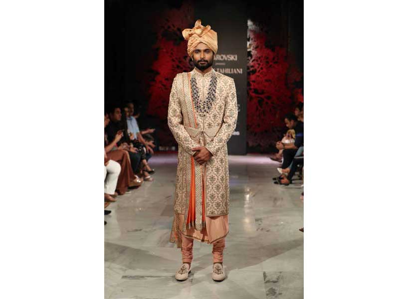 Models walk the ramp for Tarun Tahiliani's show