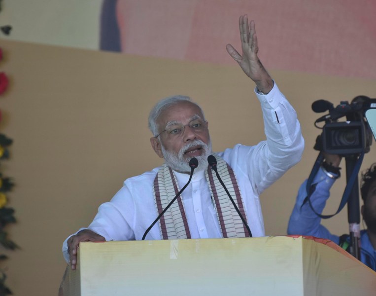 PM Modi provides milk packets to schoolchildren