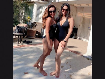 Black beauty: Sunny Leone enthralls fans with her swimwear image