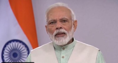 Switch off lights for nine minutes, light candles, mobile flashlights: Modi
