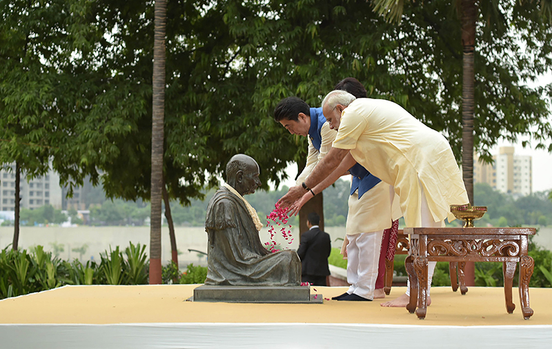 File photos of ex-Japanese PM Shinzo Abe with PM Modi during former's India visit in Sept 2017