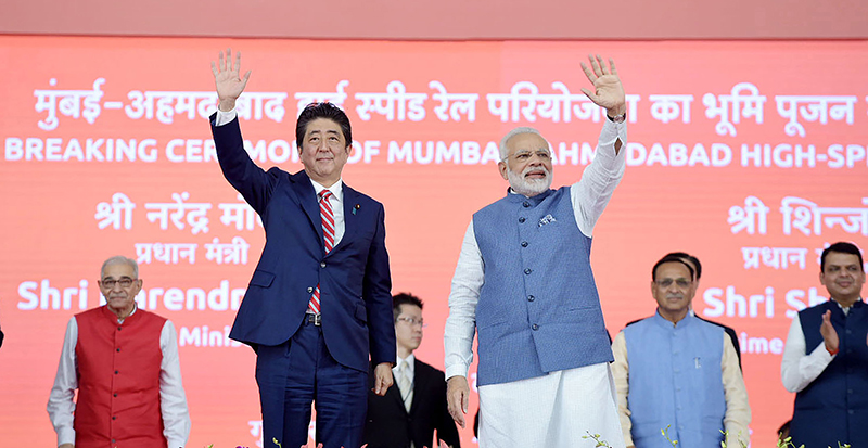 File photos of ex-Japanese PM Shinzo Abe with PM Modi during former's India visit in Sept 2017