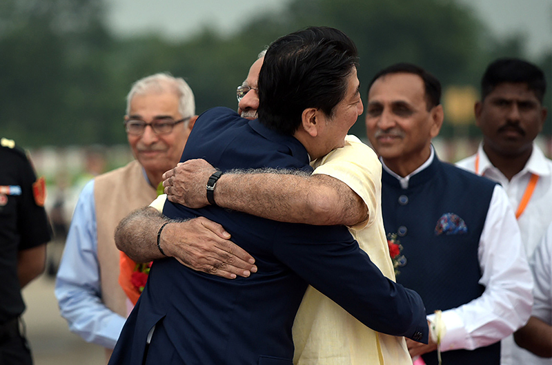 File photos of ex-Japanese PM Shinzo Abe with PM Modi during former's India visit in Sept 2017