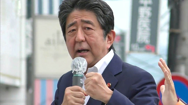 File photos of ex-Japanese PM Shinzo Abe with PM Modi during former's India visit in Sept 2017