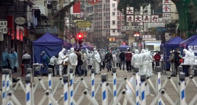 China: People scramble to buy essential supply amid Shanghai's divided lockdown