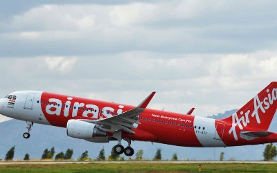 Air Asia offloads remaining 16.33 pc stake in India operations to Tata-owned Air India